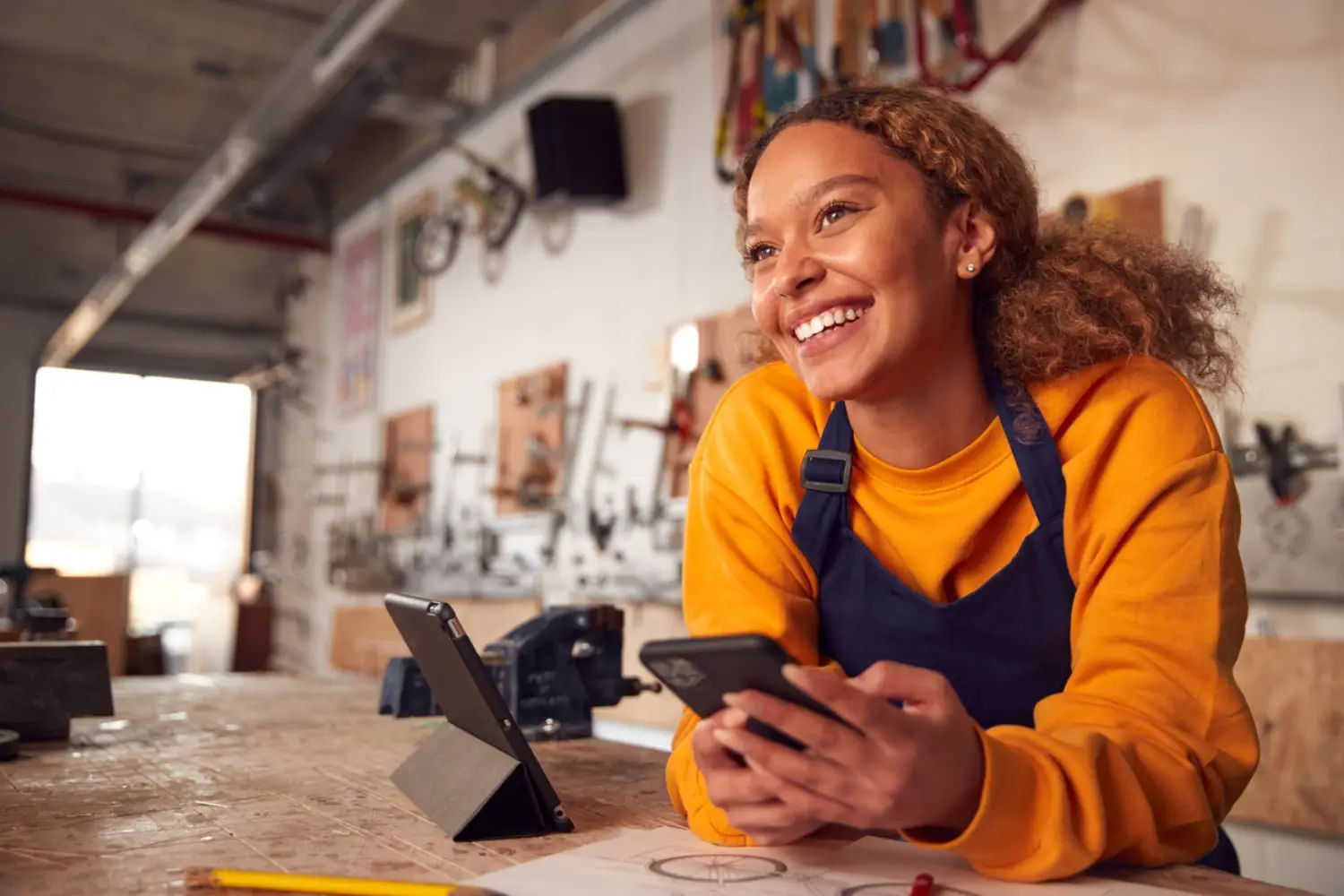 Women business owner who refinanced her debt with an SBA 7(a) loan.