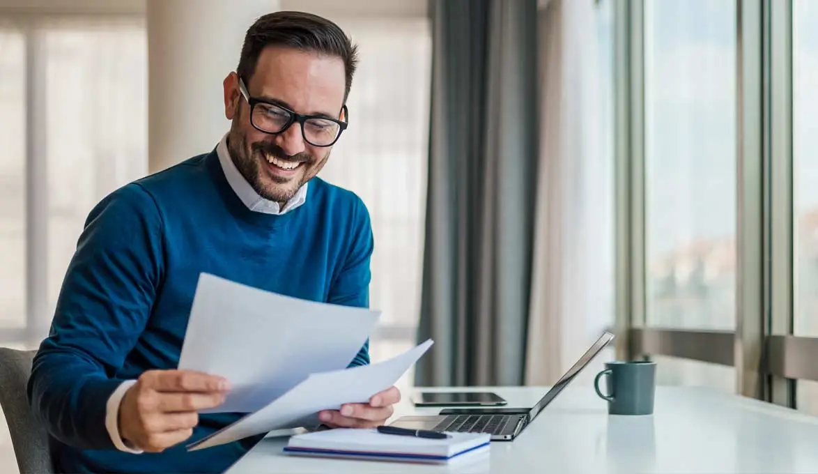 Small business owner looking over business loans that do not impact their credit score.